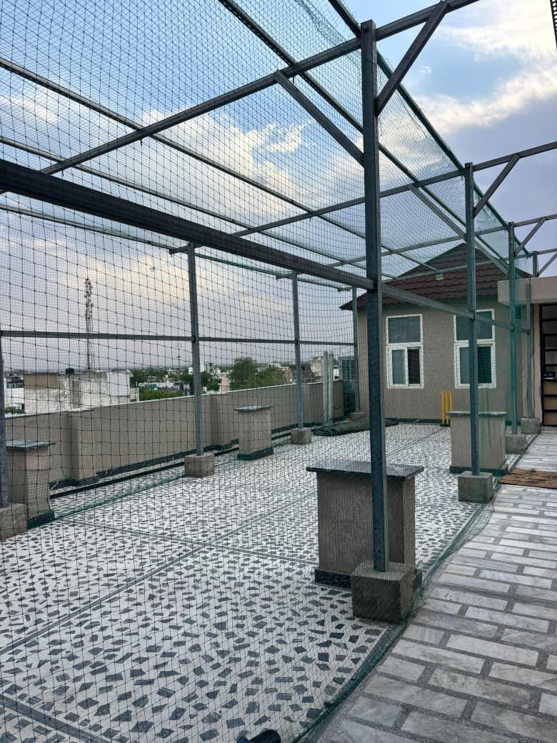 The netted rooftop cricket cage