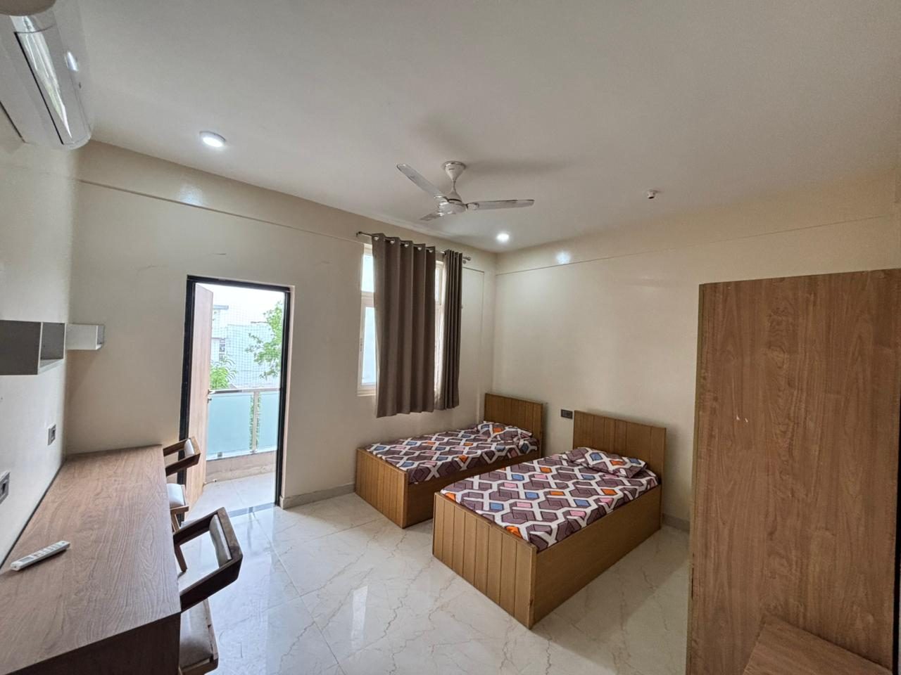 Another furnished twin room